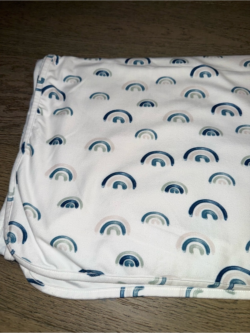 Caden Lane blue rainbow swaddle blanket